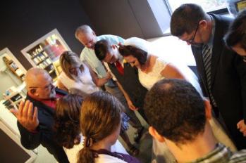 You can barely see us in the corner, but we had the tremendous honor of praying with Ryan and Emily after their wedding. 